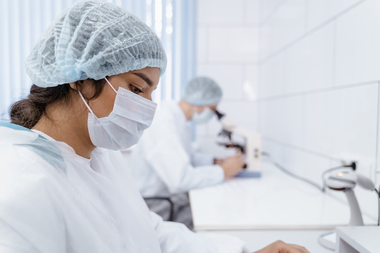 Epidemiology researchers analysing samples and studying disease patterns in a laboratory.