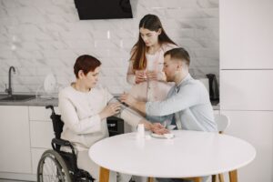 Family medicine doctor measuring the blood pressure of an elderly woman at home.